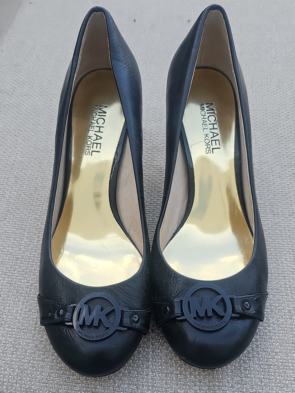 Michael Kors Black Leather Pumps with MK Medallion